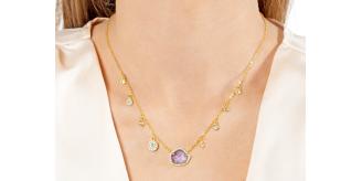 Gold Plated necklace with multiple little pendants and blue stone