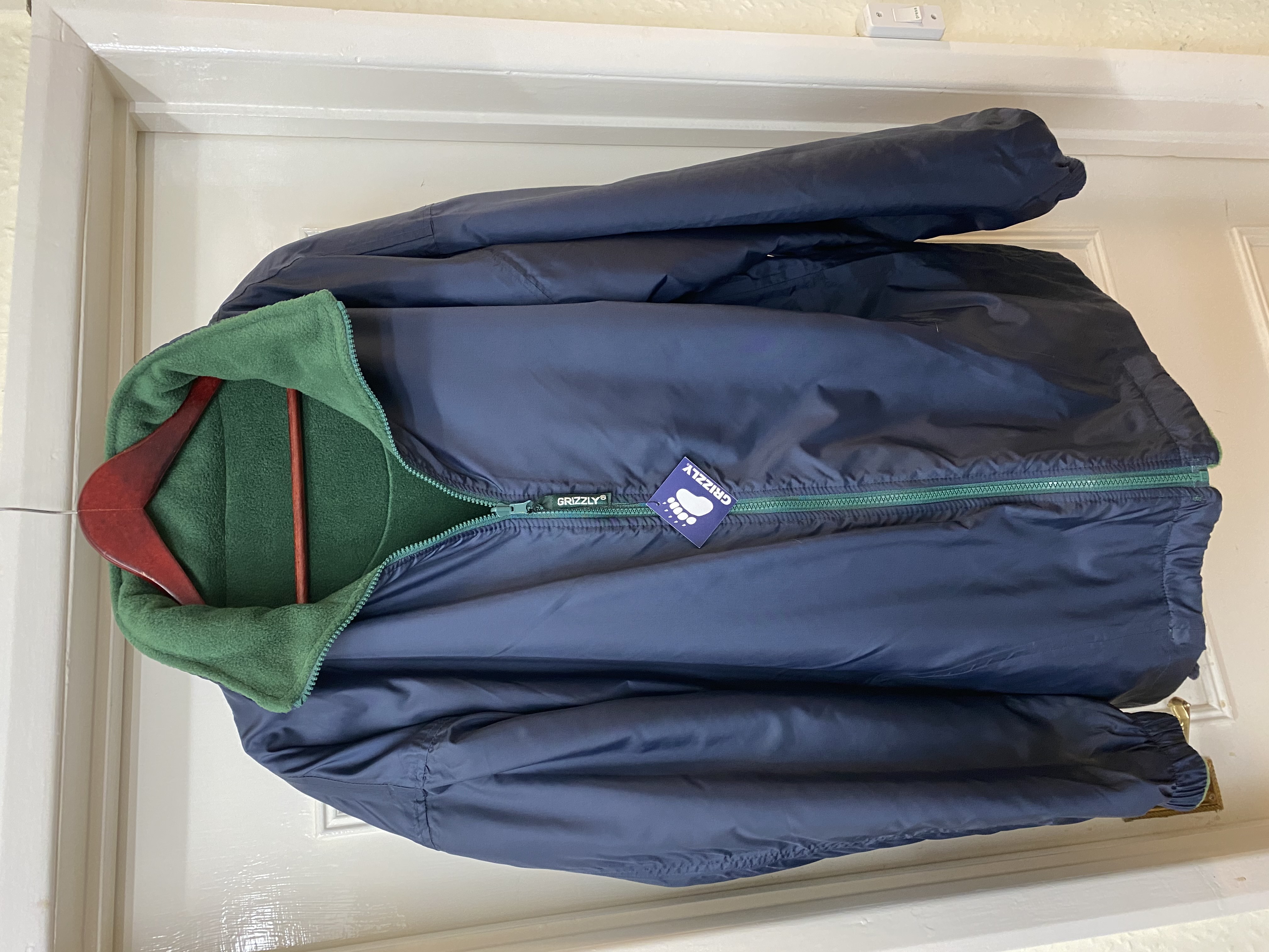 x10 Grizzly Antarctec Reversible Green Fleece and Navy Blue Waterproof Jacket