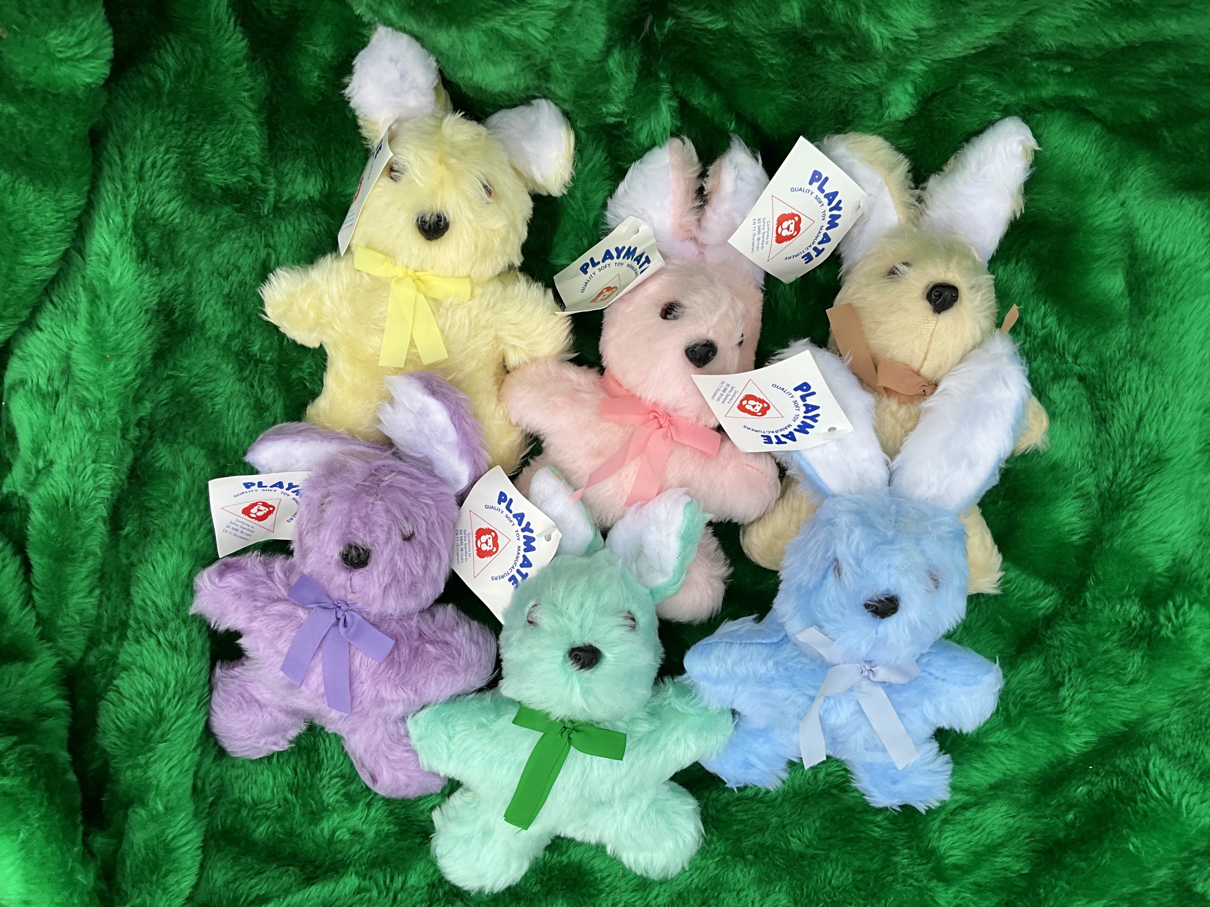 100 x 23cm plush soft toy rabbits - assorted colours