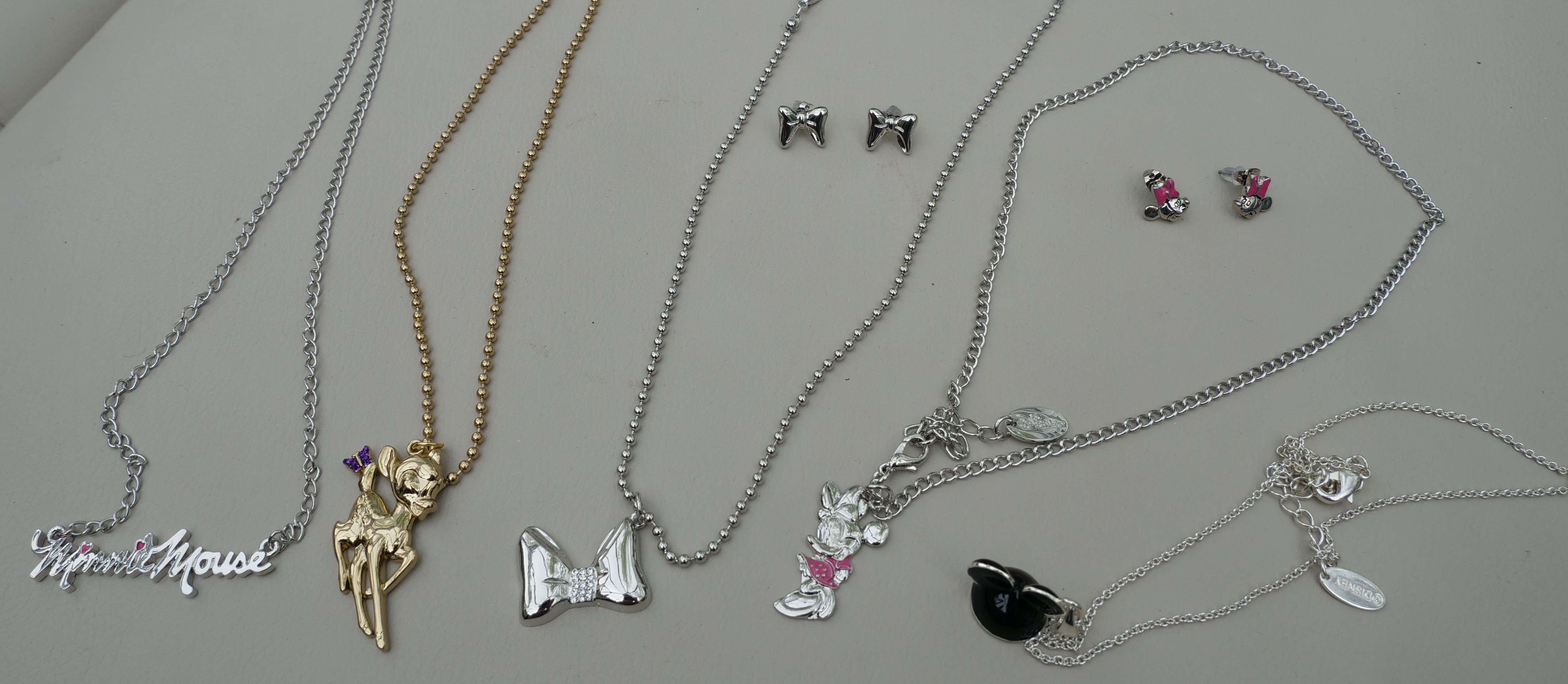 61 items of Genuine Disney jewellery. Pendants & earrings. Minnie Mickey Mouse Bambi.  
