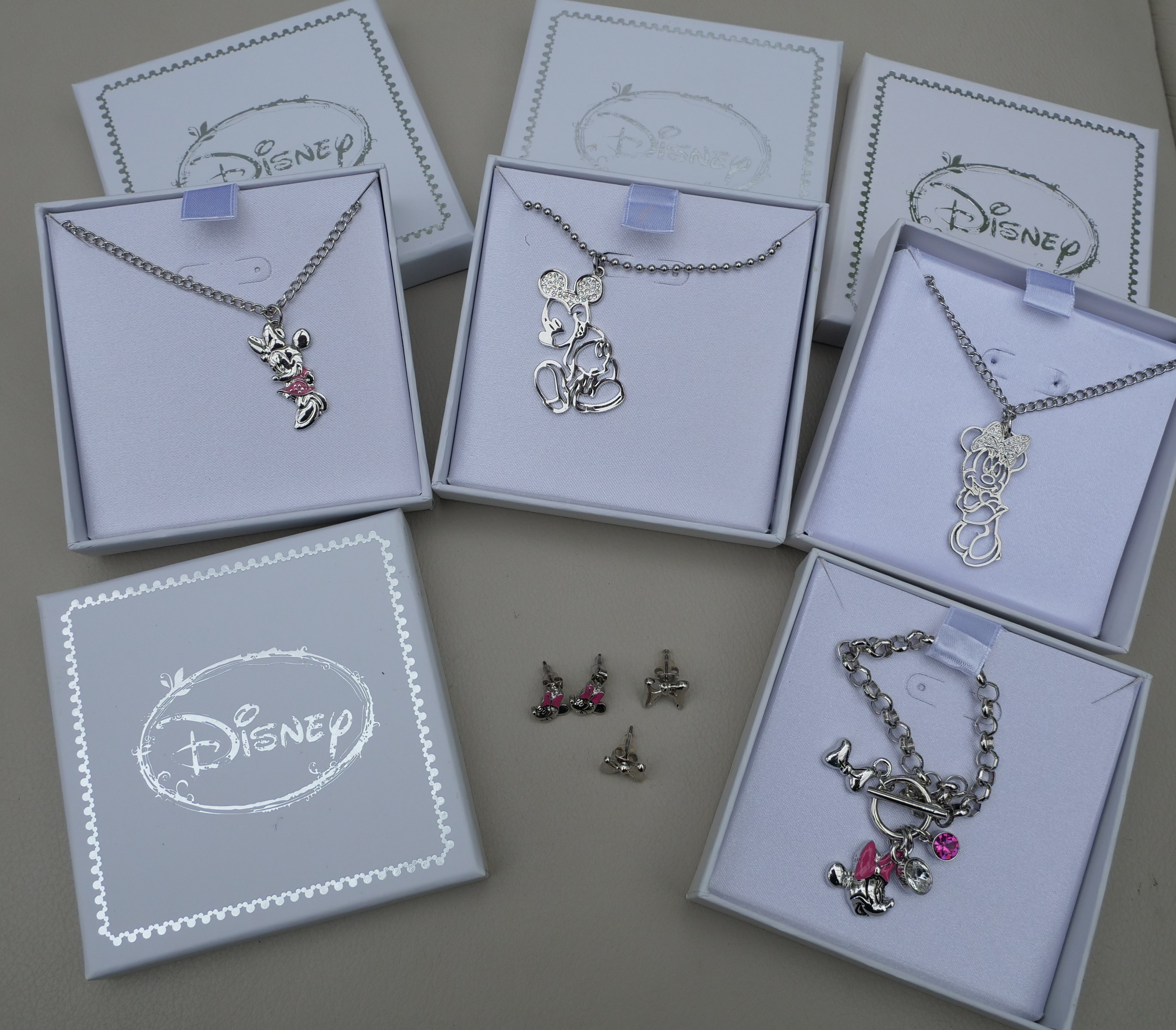 66 Items of Genuine Disney items in lovely presentation boxes Pendants, bracelets, earrings  Total RRP £1277.34
