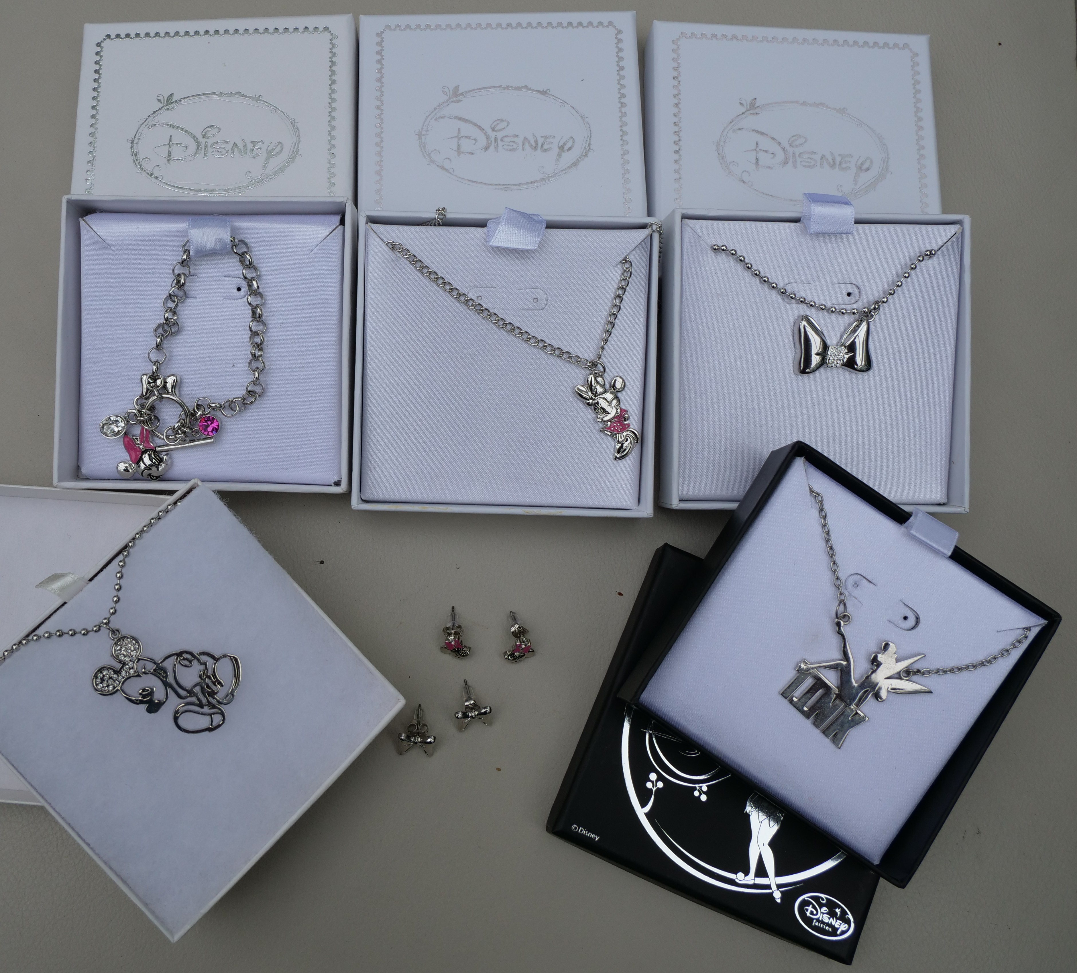 67 Genuine Disney items of jewellery RRP £1311.33 Pendants, Earrings, Bracelets.