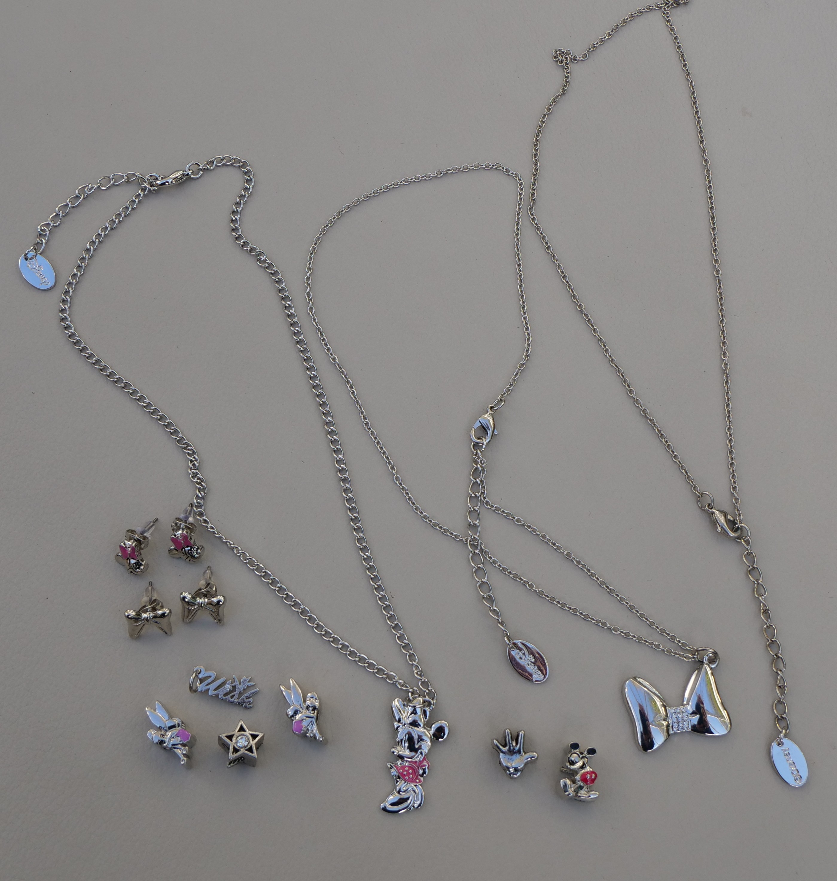 100 Items of genuine Disney Jewellery Pendants, charms, earrings RRP £1767.03
