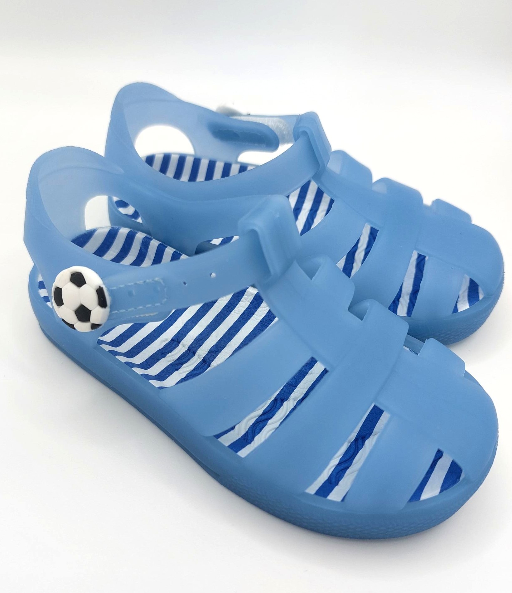 CHILDREN'S JELLIES - LIGHT BLUE WITH FOOTBALL DETAIL, 5 SIZES, 50 UNITS PER JOB LOT