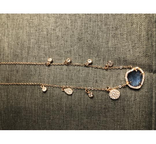 Rose gold necklace with blue stone
